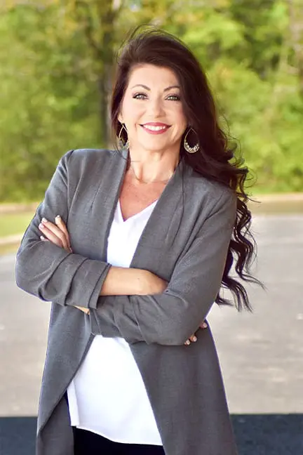 A professional headshot of Kristin Brown, APRN, at Healthy Connections.