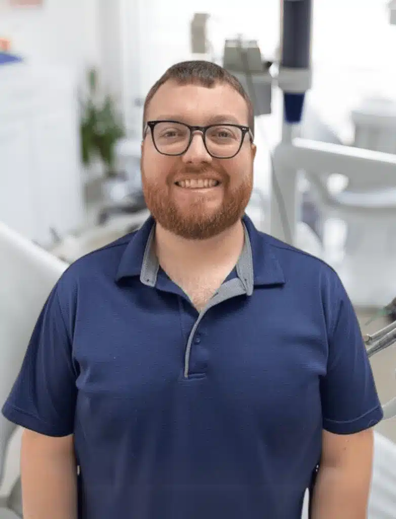 A professional headshot of Kaleb Harp, DDS, at Healthy Connections.