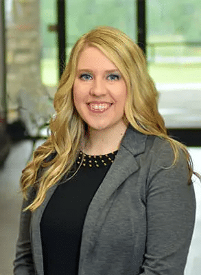 Professional headshot of Lindy Jumper, APRN, a Healthy Connections team member wearing a gray blazer and black shirt.