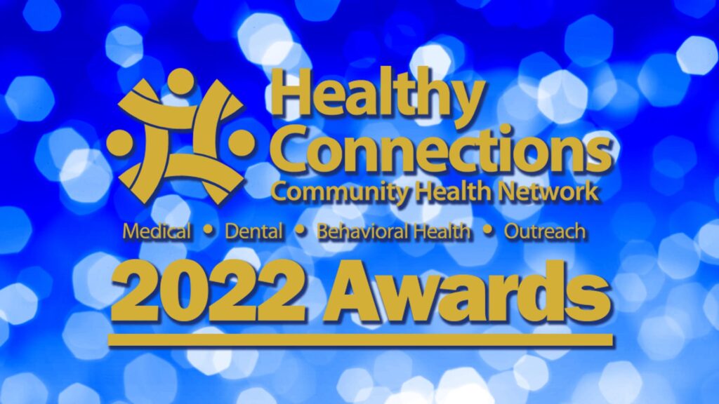 Healthy Connections logo and 2022 Awards over a blue background with light spots.